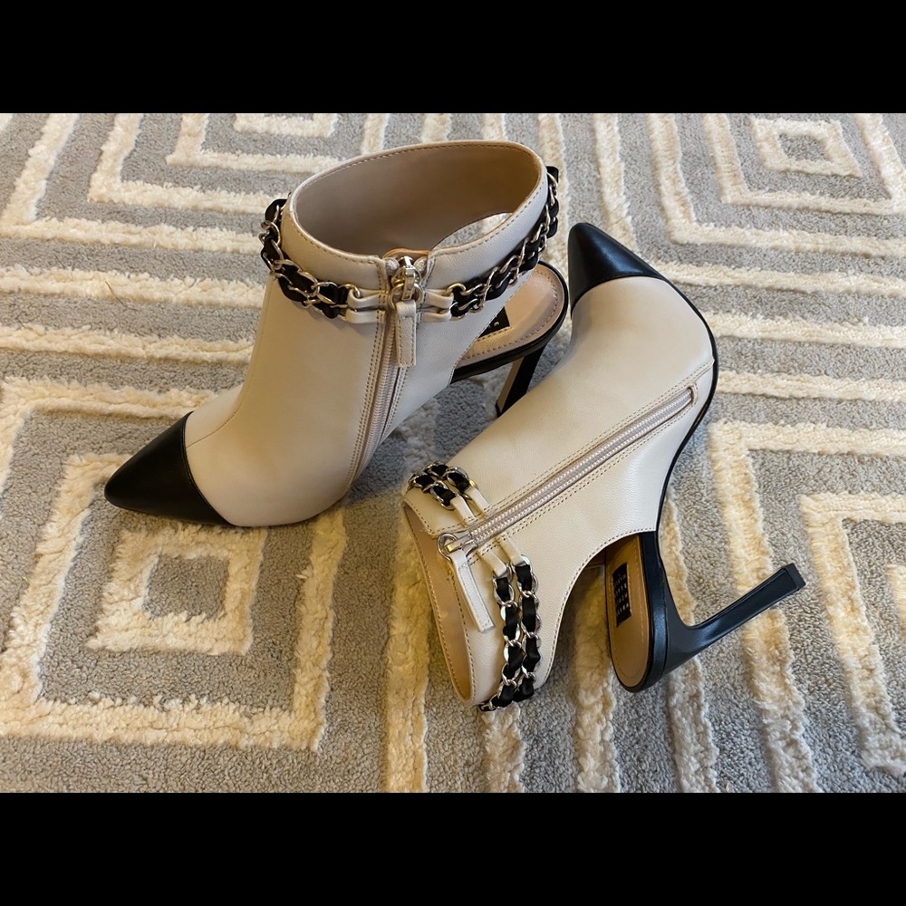 White House Black Market black and cream boots